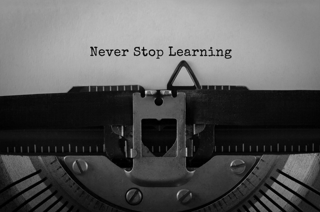 Text Never Stop Learning typed on retro typewriter